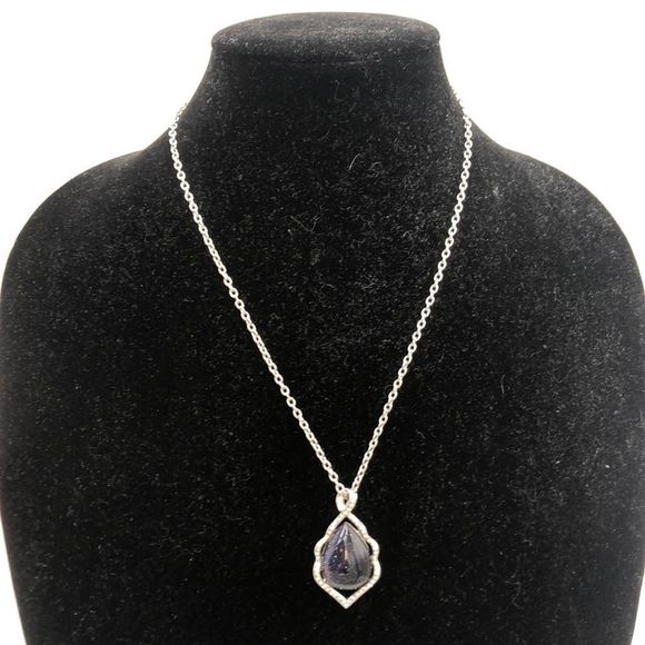Jewelry - Lovely silver necklace w/purple stone surrounded with clear crystals. 10” chain